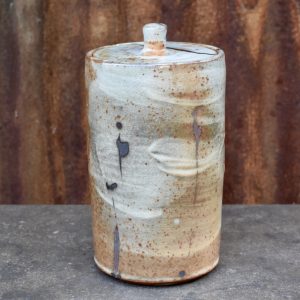 Lidded jar with bulrush motif
